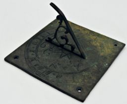 Antique bronze sundial dated 1639 with indecipherable incised inscription, 15 x 15cm