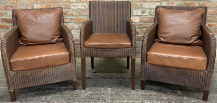 Pair of Vincent Sheppard Lloyd loom type conservatory chairs with leather cushions together with a