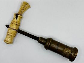 A Thomason type brass corkscrew with patent badge, 25cm fully extended