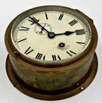 A Smith Astral brass cased bulkhead clock, single train dial with subsidiary secondary dial, 17cm D