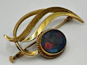 Mid 20th century 10k black opal stylised floral brooch, the stone 11 x 14mm, 4cm long in total, 4.7g