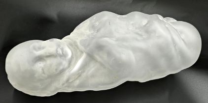 An unusual early 20th Century opaque glass figure of a swaddled baby, 50cm high.
