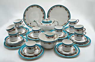 Royal Worcester tea service, with turquoise, gilt and floral boarders, comprising teapot, cups,