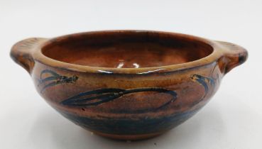 The estate of Peter & Joy Evans of Whiteway, Stroud - Winchcombe Pottery two handled, slip decorat