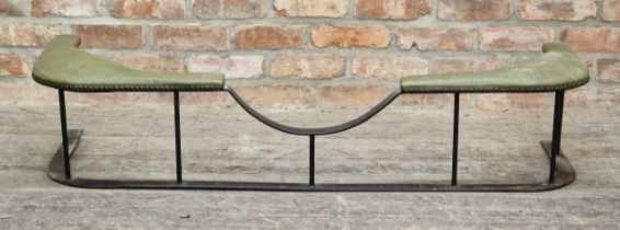Black painted wrought iron club fender with padded seats and studded edging, H 28cm x W 135cm x D