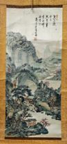 Early 20th century Chinese scroll with silk painted of a mountainous landscape, with calligraphy and