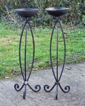 Pair of wrought iron pricket sticks, 100cm high