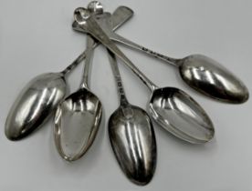 Five Georgian Hanoverian silver table spoons, various makers, 9oz approx