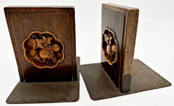 Pair of good quality Japanese bookends, with carved hardwood decoration of fruits inset within a