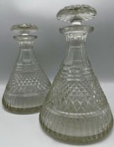 Pair of good quality hob-nail cut glass tapered decanters, with stoppers 24cm high together with a