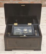 19th century orchestral music box fitted with drum and bells, ebonised case, 39cm long (af)