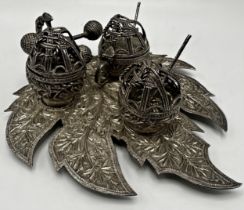 Remarkable Indian Kashmiri silver cruet set, salt, pepper and mustard with caged tops and