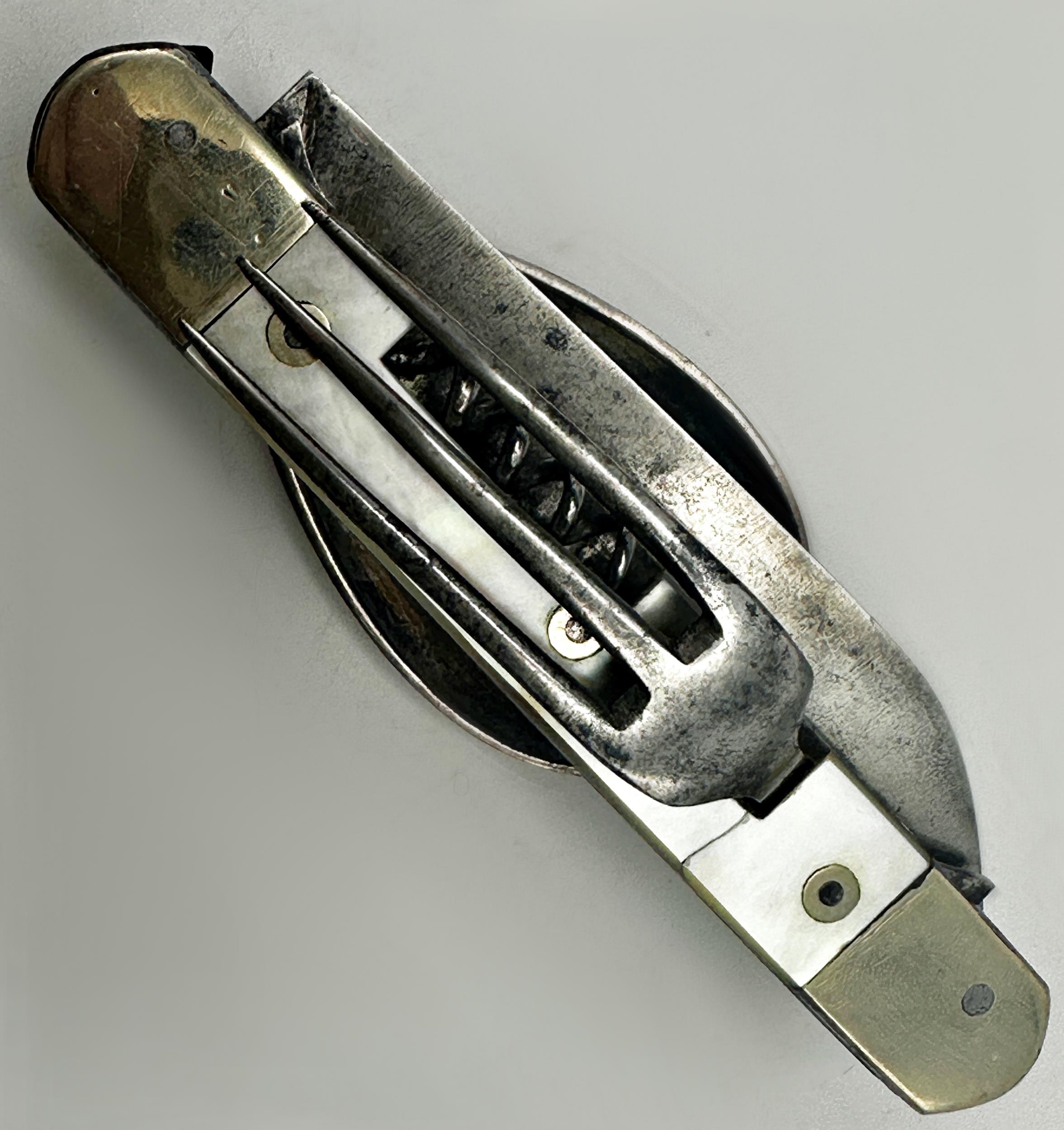 Turn of the century pearl and steel pocket knife comprising fork, spoon and corkscrew, 13cm long - Image 3 of 3