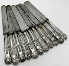 Eleven antique white metal kings pattern handled steel blade table knives, by Brumby & Middleton,