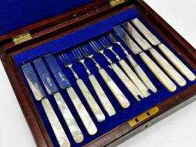 Victorian canteen of mother of pearl and silver dessert knives and forks for six, maker Spink & Son,