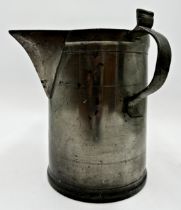 Good large antique twin handled pewter jug, 26cm high