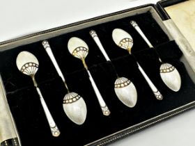 Cased set of six silver gilt and enamel inlaid coffee spoons, maker marks indistinct, Birmingham