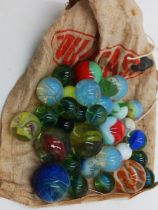 The estate of Peter & Joy Evans of Whiteway, Stroud - thirty two vintage and antique glass marbles