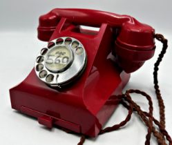 Vintage red Bakelite telephone