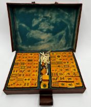 Vintage leather cased complete Mahjong set, the case 24cm x 34cm