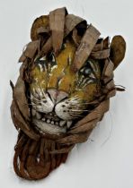 Unusual wooden tribal mask of a tiger, with leaf main, 36cm high