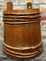 Primitive coopered grain barrel with bamboo strapwork, 60cm high x 58cm diameter