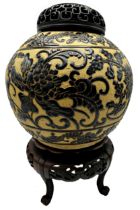 Good Chinese provincial baluster pottery ginger jar with brown enamel relief of floral trails upon a