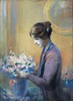 Edward Handley-Read (British 1870-1935) - A lady arranging flowers, signed, pastel, 77 cm x 55 cm.