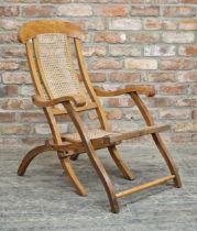 Antique folding campaign steamer chair with cane seat and back, H 90cm x W 59cm x D 82cm