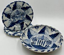 Isis blue and white pottery, with expansive delft tulip decoration, fruit bowl and two plates (3)