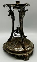 Good quality silver centrepiece base, three stag head columns on hoof feet framing a coiled snake