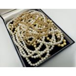 String of pearls with 9ct clasp, 48cm long and another with 9ct clasp, 72cm long, three further