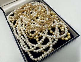 String of pearls with 9ct clasp, 48cm long and another with 9ct clasp, 72cm long, three further