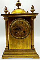 French gilt metal mantel clock with Corinthian column pillared case mounted by an Islamic finial,