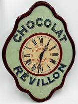 Advertising - Chocolat Revillon enamelled toleware wall clocks, with brass movement, 59 x 44cm