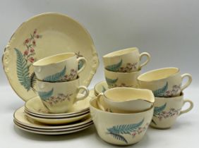 A collection of Beswick A Marie pattern tea wares comprising six teacups and saucers, side plates,