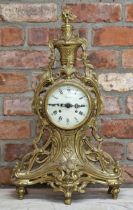 French rococo style gilt cast metal mantel clock, twin train enamel dial, in a case with pierced