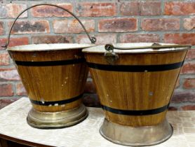 Pair of 19th century toleware buckets with simulated coopered decoration upon brass plinth base,