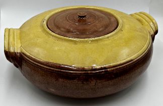 Good early 20th century French glazed terracotta lidded cooking pot, 16cm high x 49cm wide