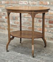 19th century inlaid walnut and rosewood two tier side table of oval form, on brass castors, H 73cm x