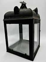 19th century pagoda shaped japanned tin hall lantern, with glass base, 38cm high