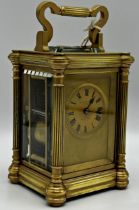 Late 19th century Goldsmith Alliance of London strike and repeat carriage clock, circular gilt