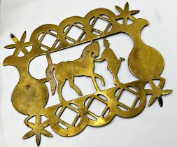 19th century pierced brass plaque of horse and rider, 18 x 23cm