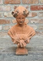 Terracotta bust of a lady with floral headdress, H 48cm x W 30cm