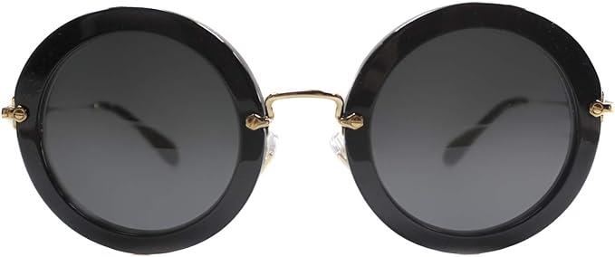 A pair of Miu Miu Woman's black round-frame sunglasses. Model number SMU 13N. In unused condition