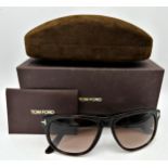 A pair of Tom Ford brown square frame men's sunglasses with brown lenses and signature T inserts