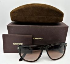 A pair of Tom Ford brown square frame men's sunglasses with brown lenses and signature T inserts