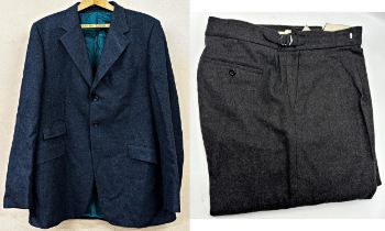 A black wool suit by Pakeman Catto & Carter with a further pair of black wool trousers
