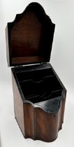 Georgian mahogany serpentine knife box the hinged lid enclosing a waterfall bookcase interior,