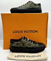 A pair of khaki and black canvas / leather Louis Vuitton monogram trainers, size 36. In unused
